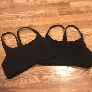 Two black lululemon times train bra size 6